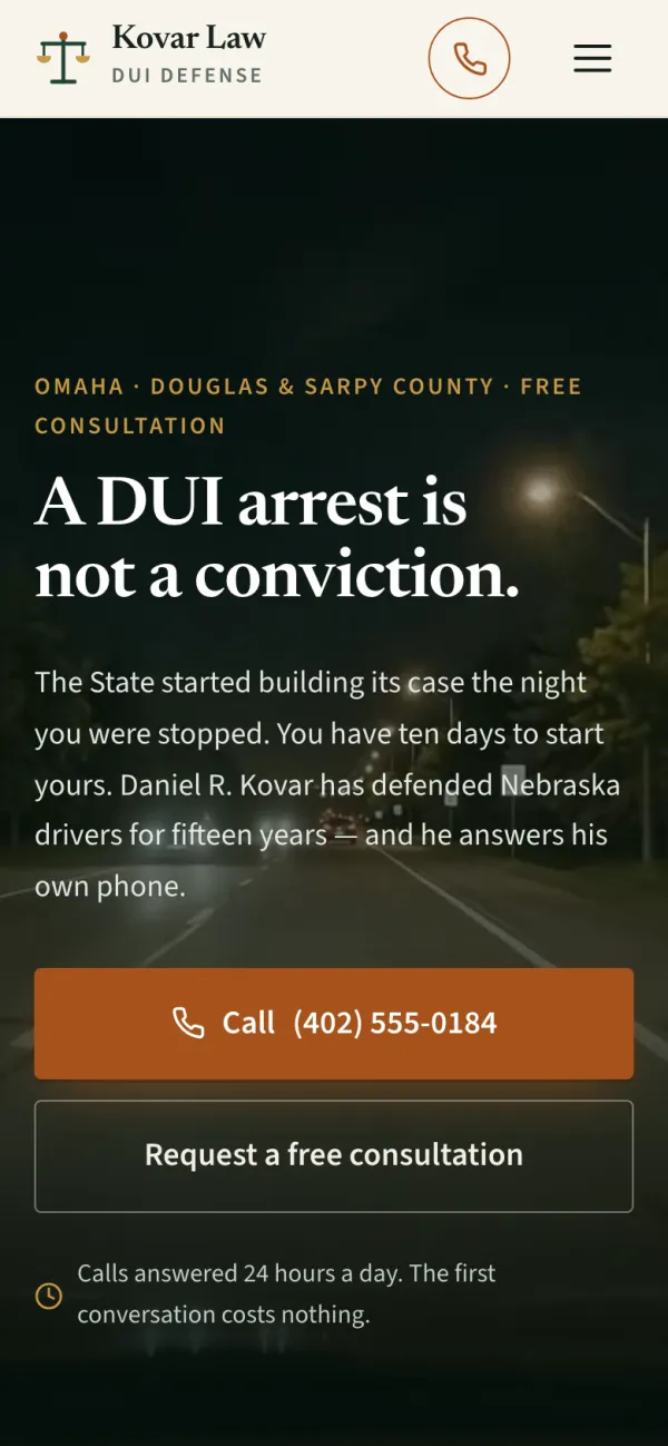 The Kovar Law homepage on a phone screen, headline “A DUI arrest is not a conviction”.